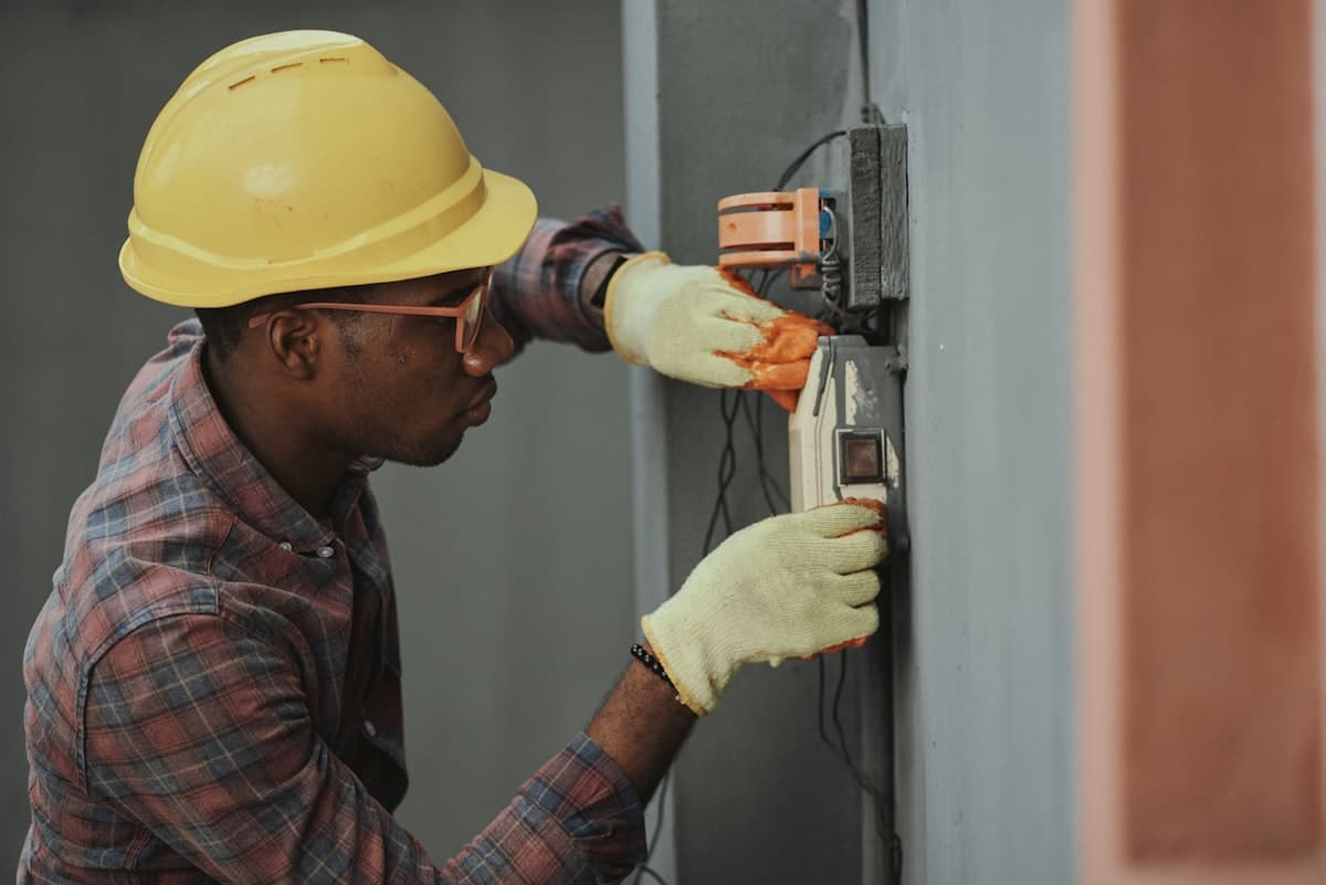 Electrician working at a residential service panel